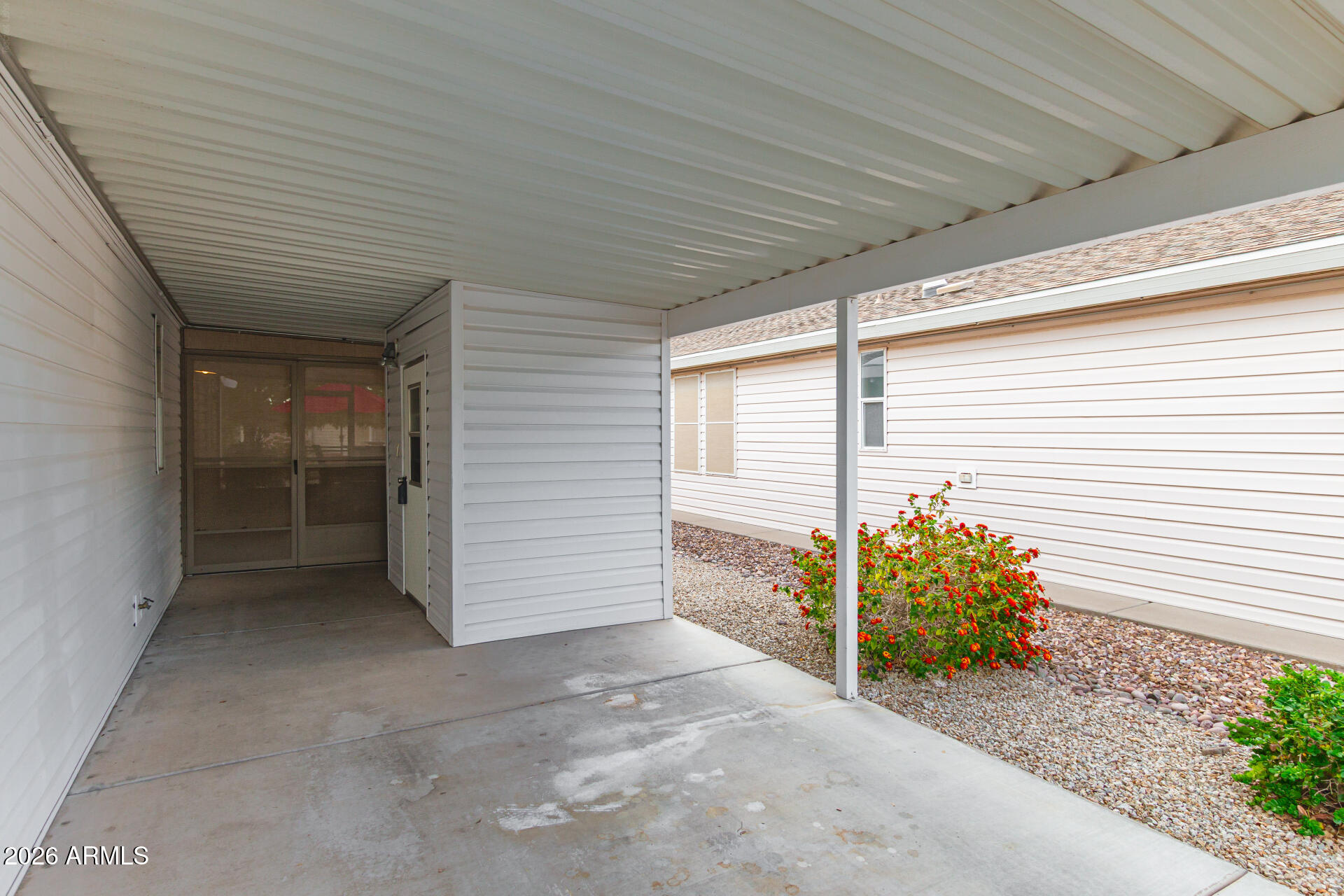 3301 South Goldfield Road, Unit 2004 Apache Junction, AZ 85119 - Photo 27 of 40 a view of a porch with furniture