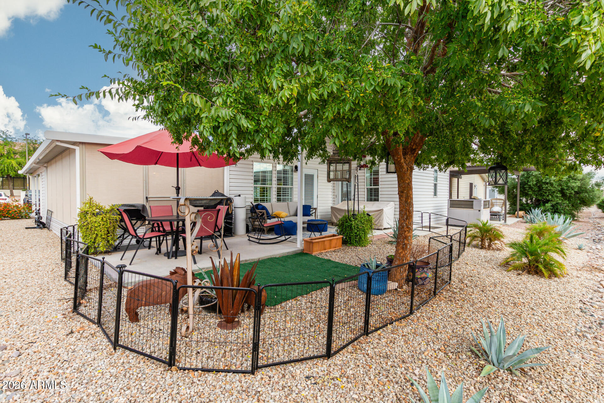 3301 South Goldfield Road, Unit 2004 Apache Junction, AZ 85119 - Photo 30 of 40 an outdoor space with seating space