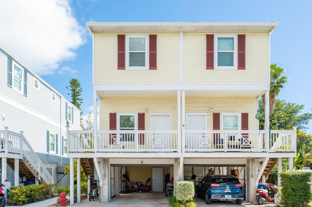 5030 5th Avenue, Unit 2 Key West, FL 33040 - Photo 1 of 16 a building with multiple windows