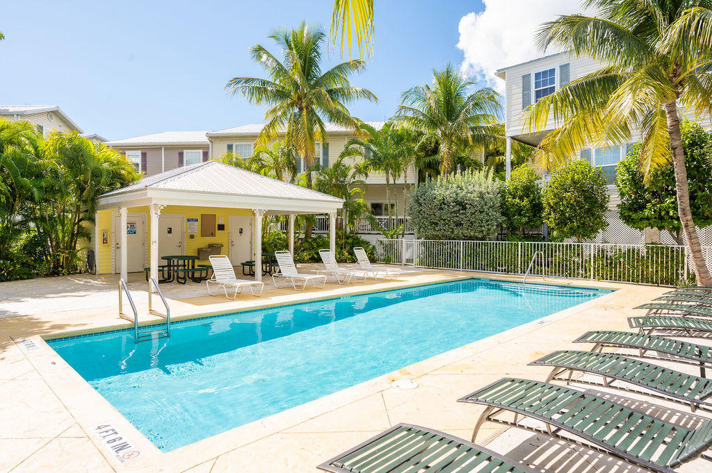 5030 5th Avenue, Unit 2 Key West, FL 33040 - Photo 16 of 16 a view of a house with swimming pool and porch with furniture