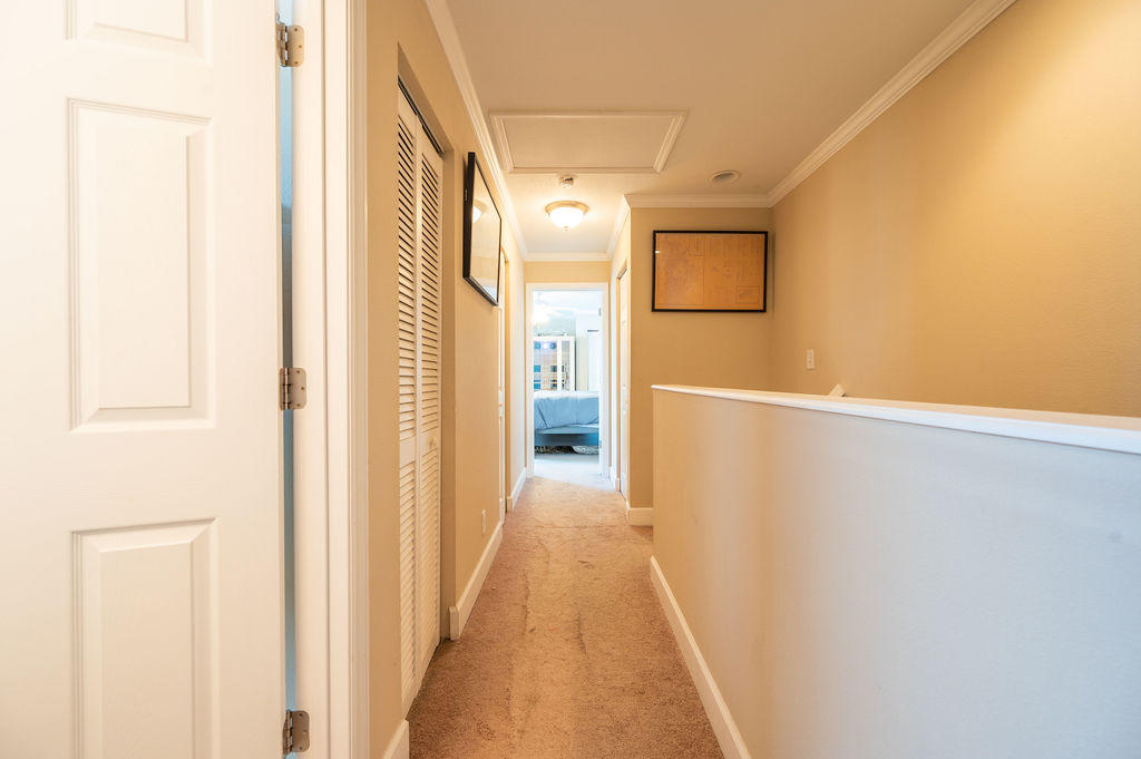 5030 5th Avenue, Unit 2 Key West, FL 33040 - Photo 8 of 16 a view of a hallway with a white door