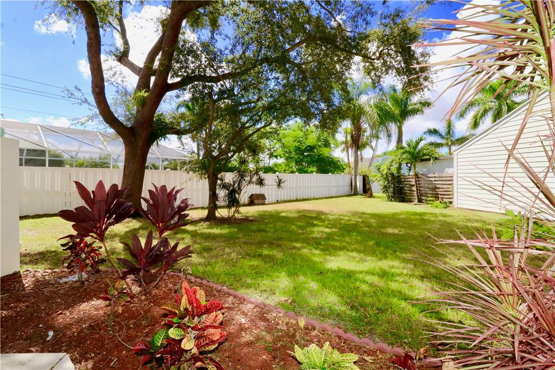 23237 Bentley Place Boca Raton, FL 33433 - Photo 13 of 16 a view of backyard with tree