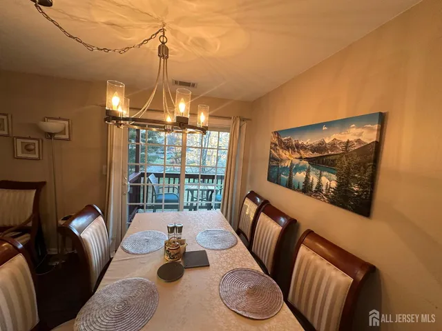 a bedroom with a bed and a view of bathroom