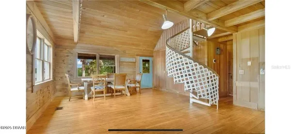 a view of living room and dining room