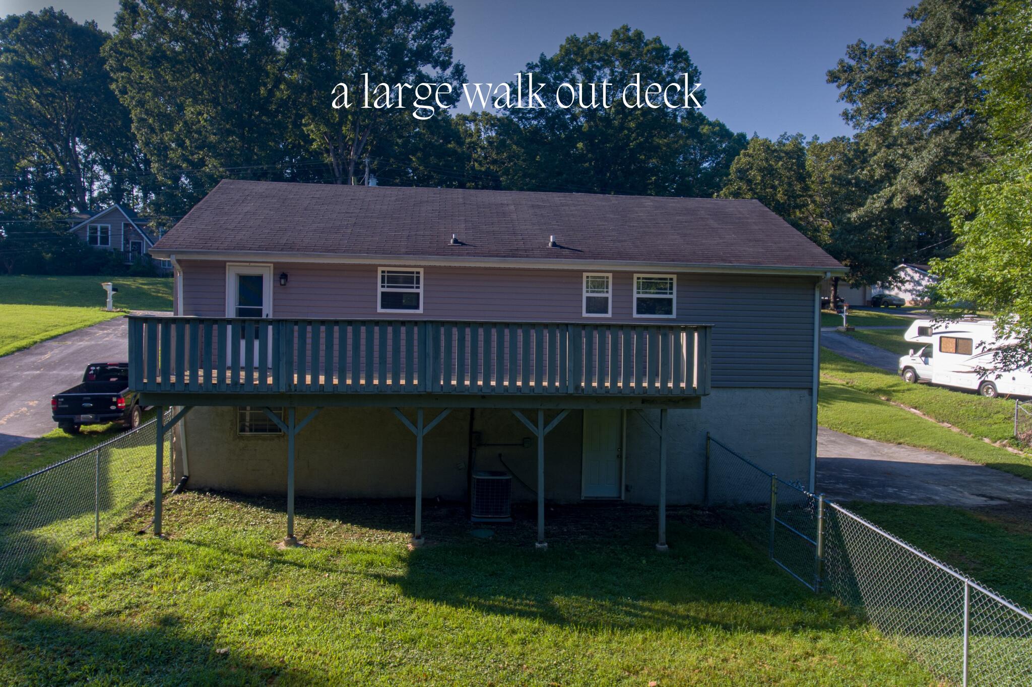 7115 Elmbrook Lane Harrison, TN 37341 - Photo 2 of 31 A LARGE WALK OUT DECK