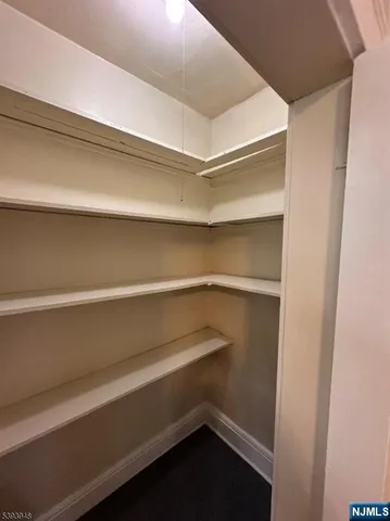 a storage room with washer and dryer