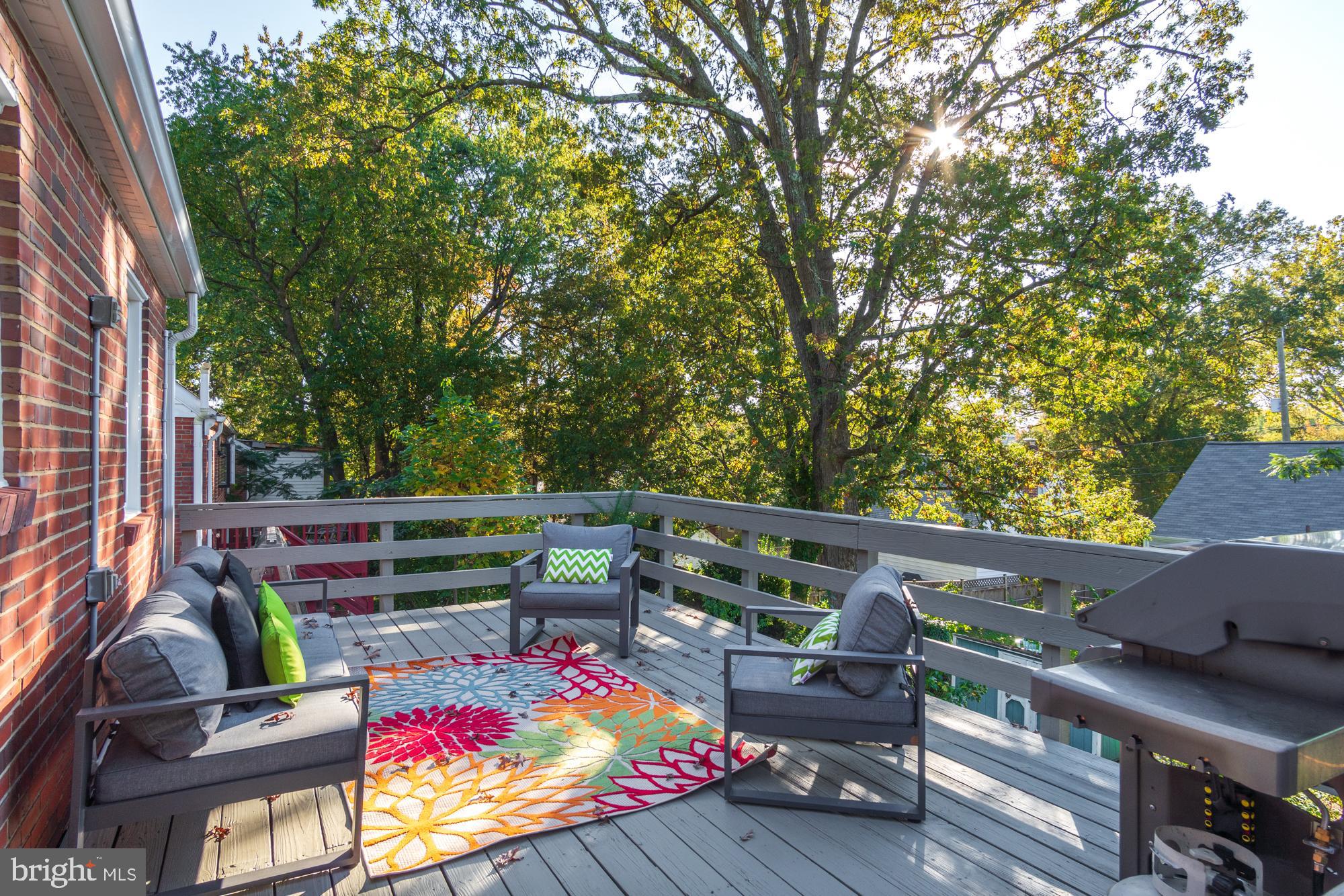 10418 Hemley Lane Silver Spring, MD 20902 - Photo 20 of 32 Spacious rear deck overlooking trees