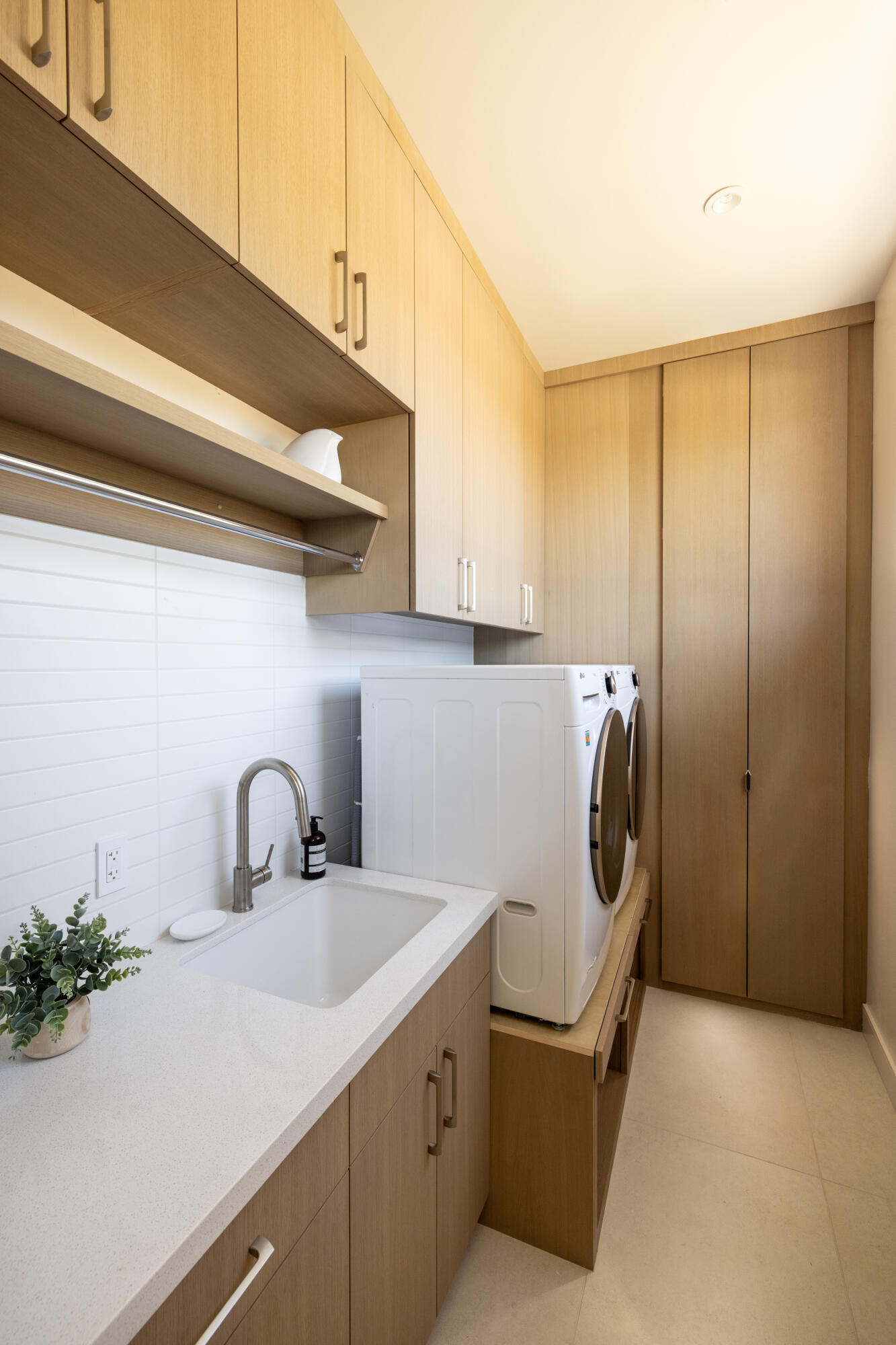 96 Royal St Georges Way Rancho Mirage, CA 92270 - Photo 21 of 34 a kitchen with a sink a refrigerator and cabinets
