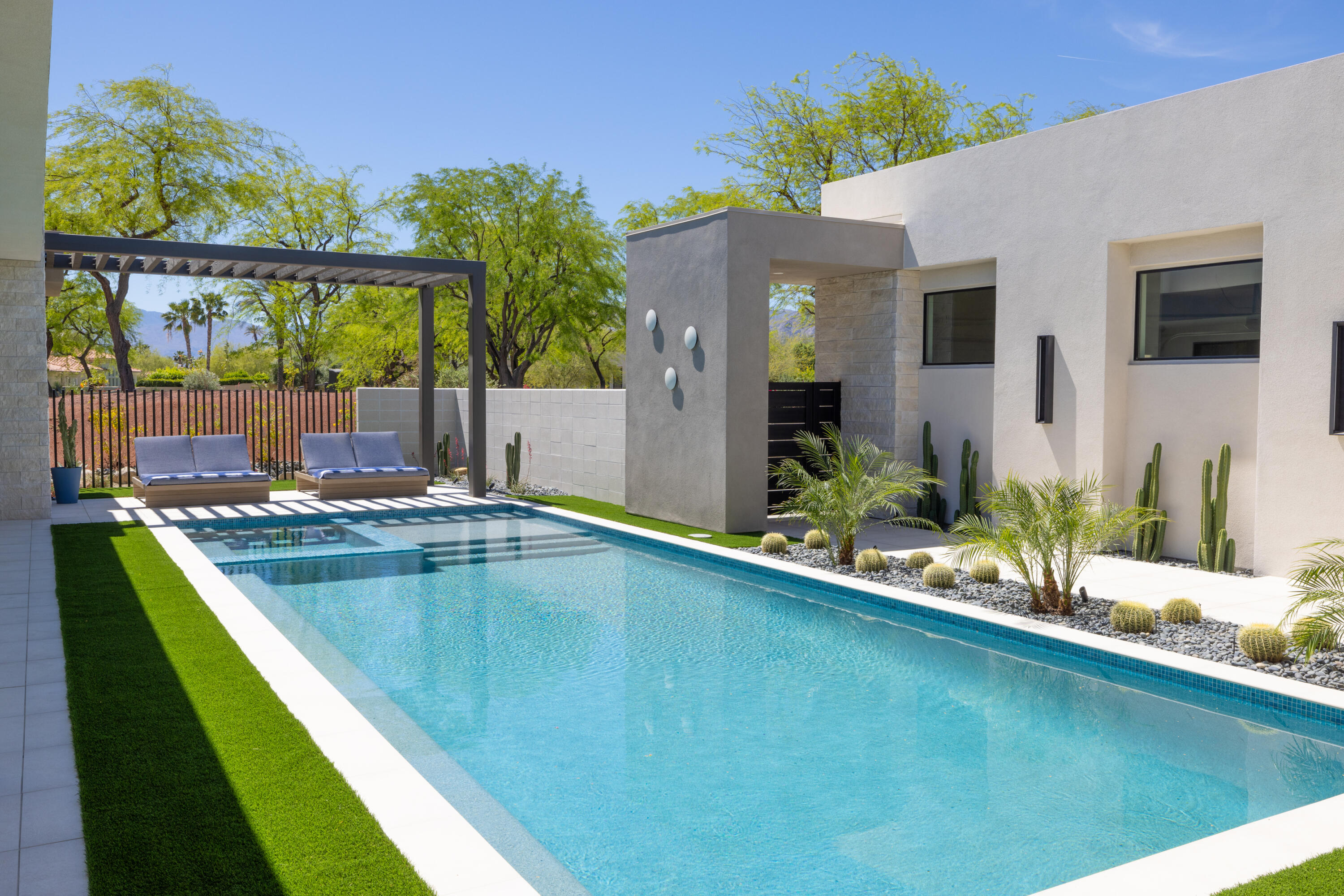 96 Royal St Georges Way Rancho Mirage, CA 92270 - Photo 26 of 34 a view of swimming pool with a patio