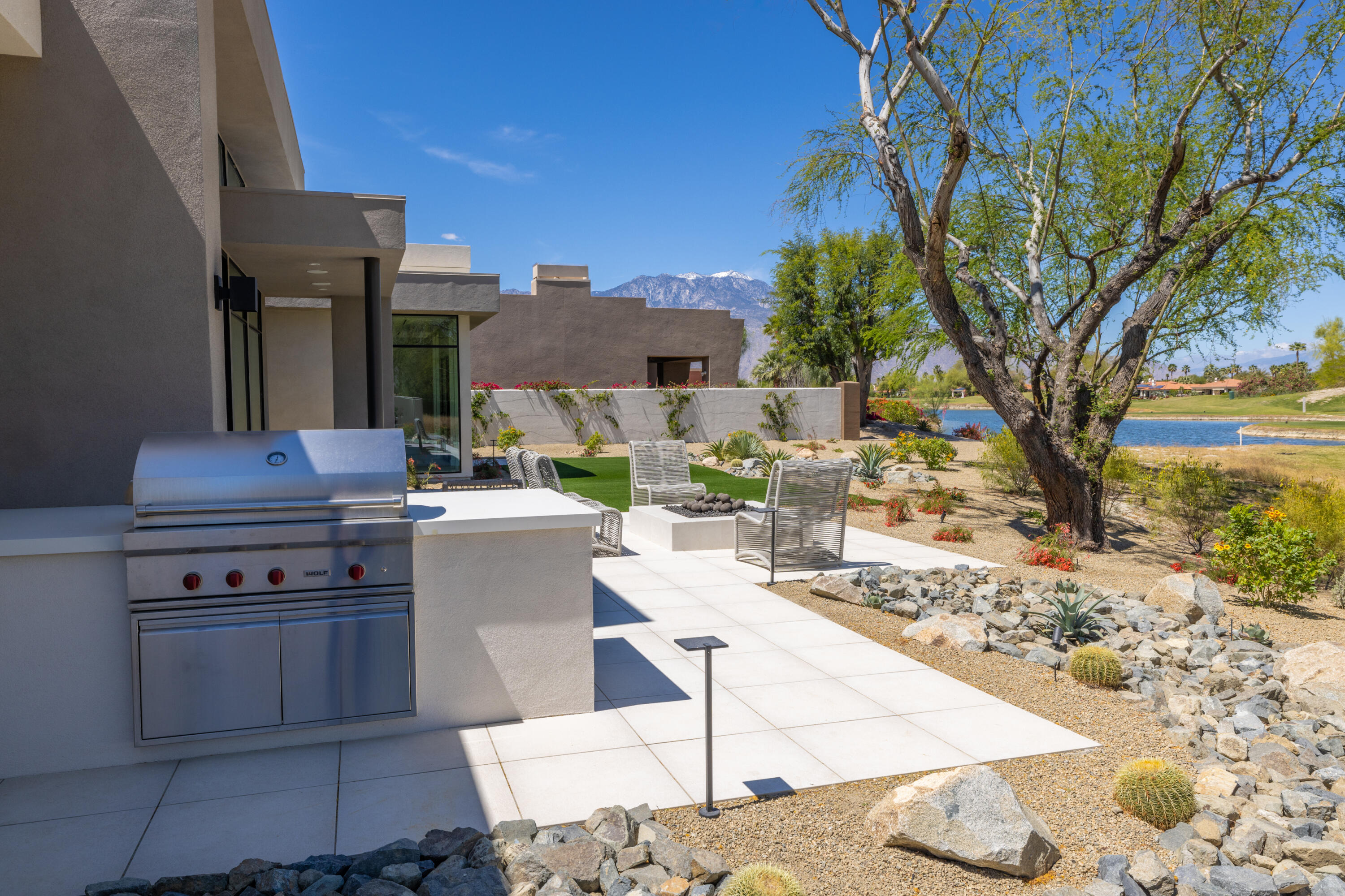 96 Royal St Georges Way Rancho Mirage, CA 92270 - Photo 28 of 34 a view of a kitchen with seating area