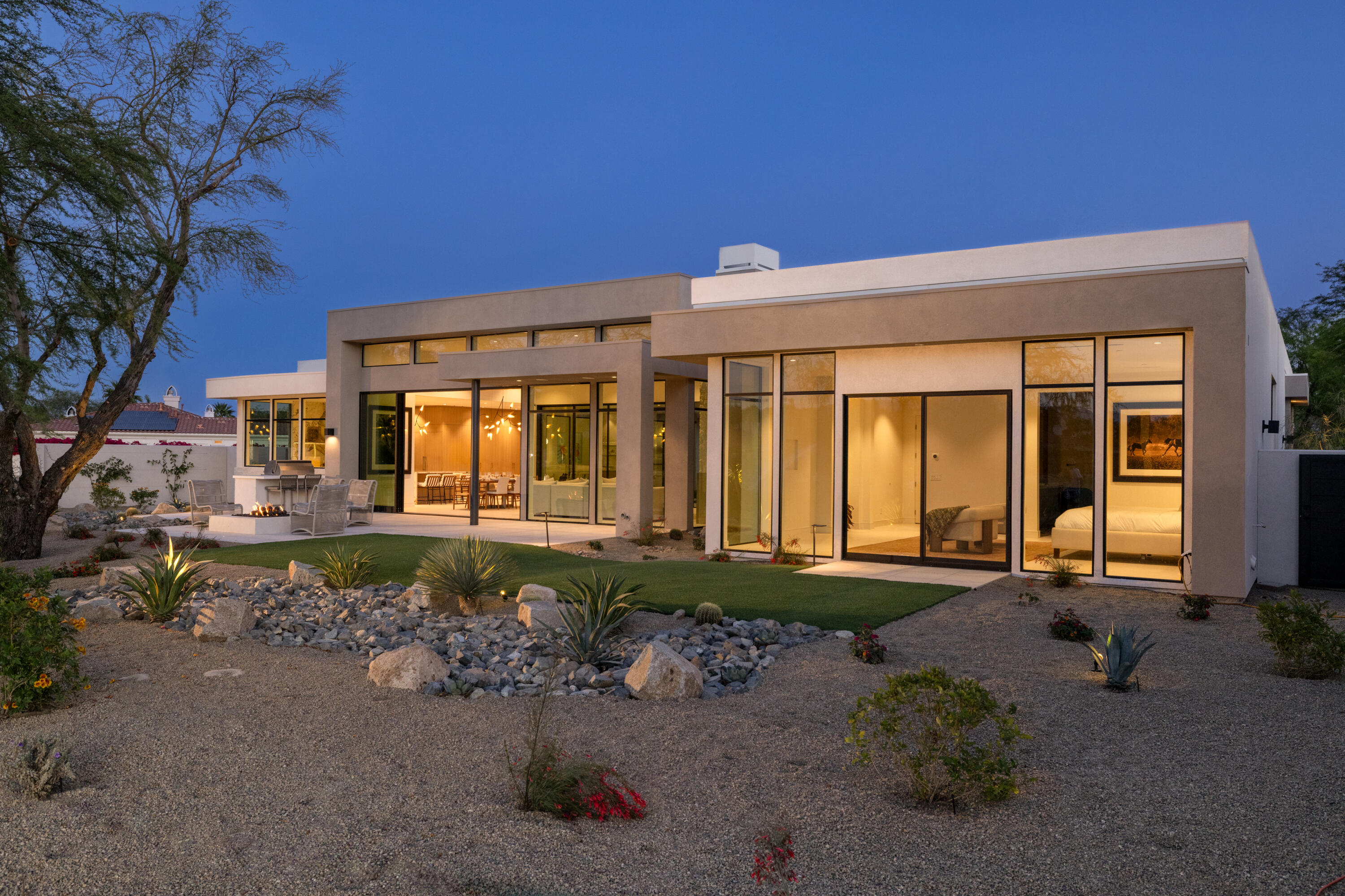 96 Royal St Georges Way Rancho Mirage, CA 92270 - Photo 29 of 34 a front view of a house with garden