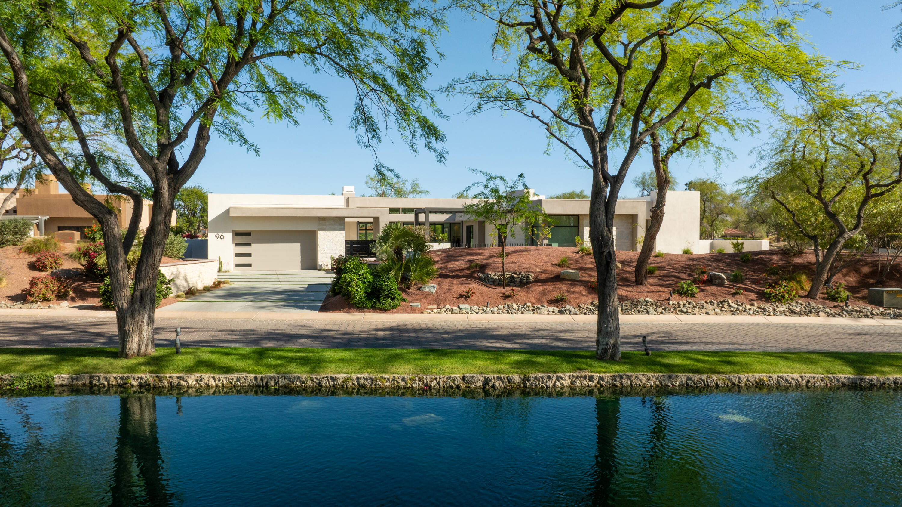 96 Royal St Georges Way Rancho Mirage, CA 92270 - Photo 3 of 34 a view of a house with a yard