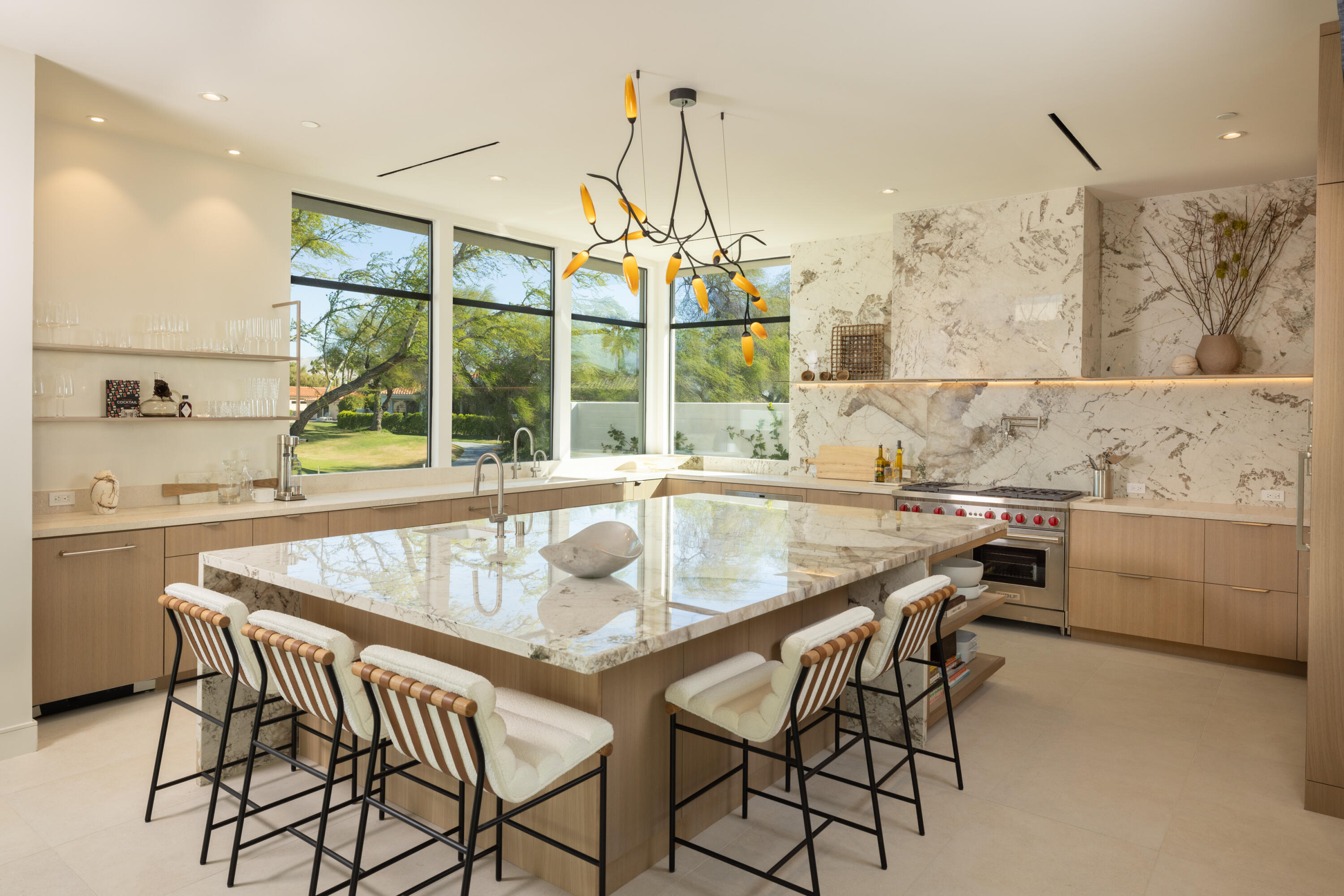 96 Royal St Georges Way Rancho Mirage, CA 92270 - Photo 6 of 34 a view of a dining room with furniture and a chandelier
