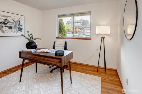 a view of a workspace with furniture