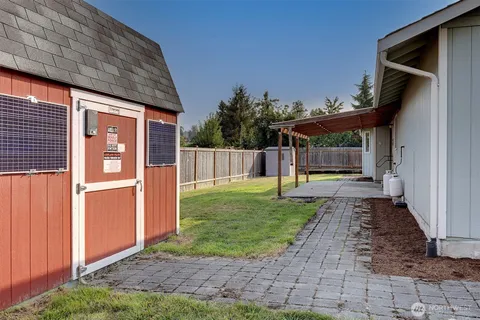 a view of a back yard of the house