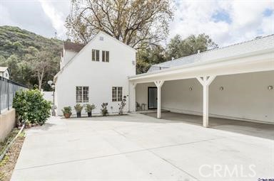 6846 St Estaban Street Tujunga, CA 91042 - Photo 11 of 13 a view of a house with a outdoor space