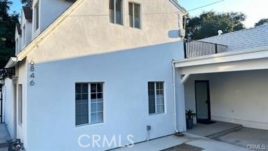 6846 St Estaban Street Tujunga, CA 91042 - Photo 2 of 13 a view of a house with a door and wooden floor