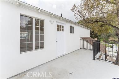 6846 St Estaban Street Tujunga, CA 91042 - Photo 6 of 13 a view of a house with a large window