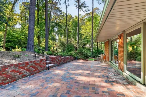 a view of backyard with green space