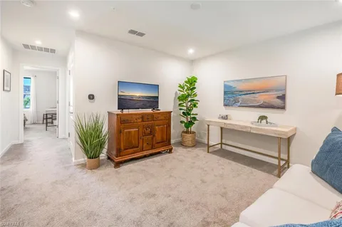 a bathroom with a double vanity sink and mirror