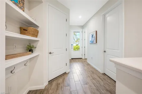 a bedroom with a bed and a table in it