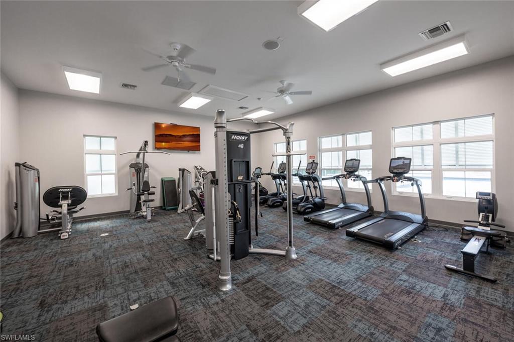 4720 Arboretum Circle, Unit 102 Naples, FL 34112 - Photo 41 of 44 a view of a room with gym equipment