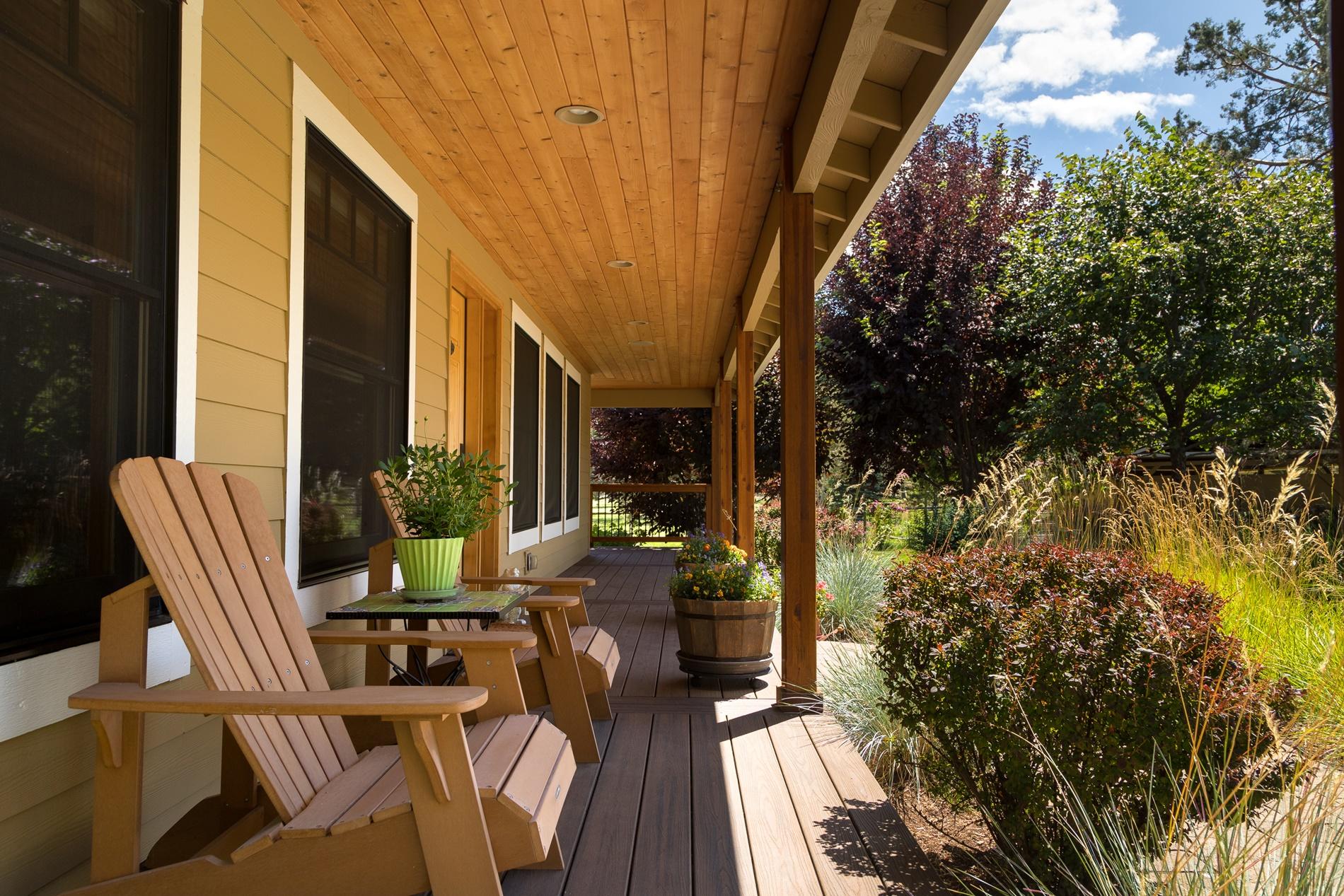 64980 Gerking Market Road Bend, OR 97703 - Photo 6 of 35 Covered front porch overlooking the large pond to the West. The Trex deck is less than 2 years old.