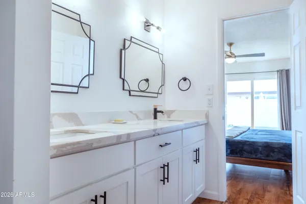 a view of a swimming pool with a lounge chairs