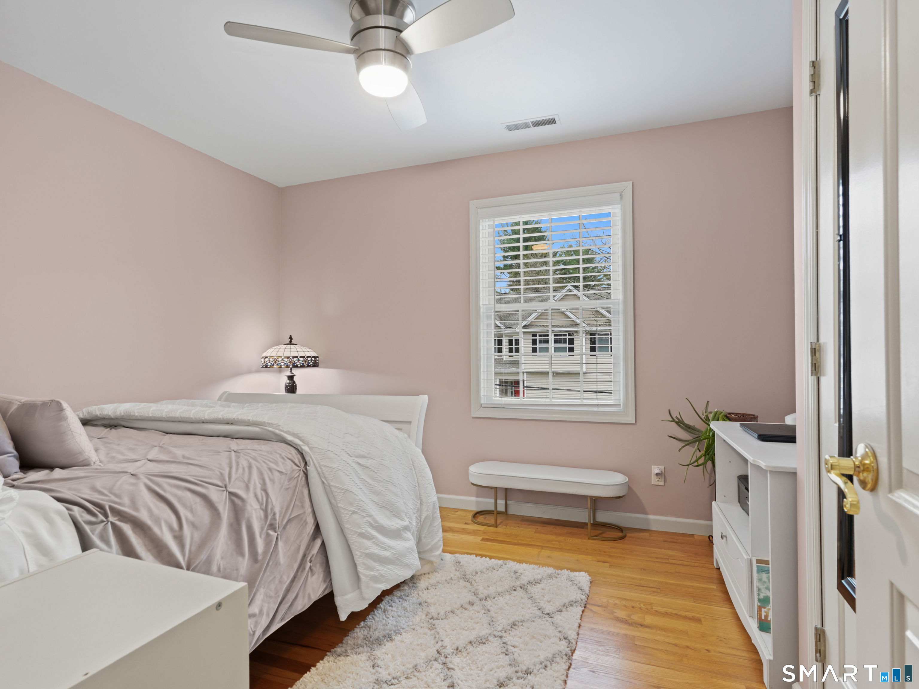82 Ramapoo Road Ridgefield, CT 06877 - Photo 27 of 40 a bedroom with a bed and a window