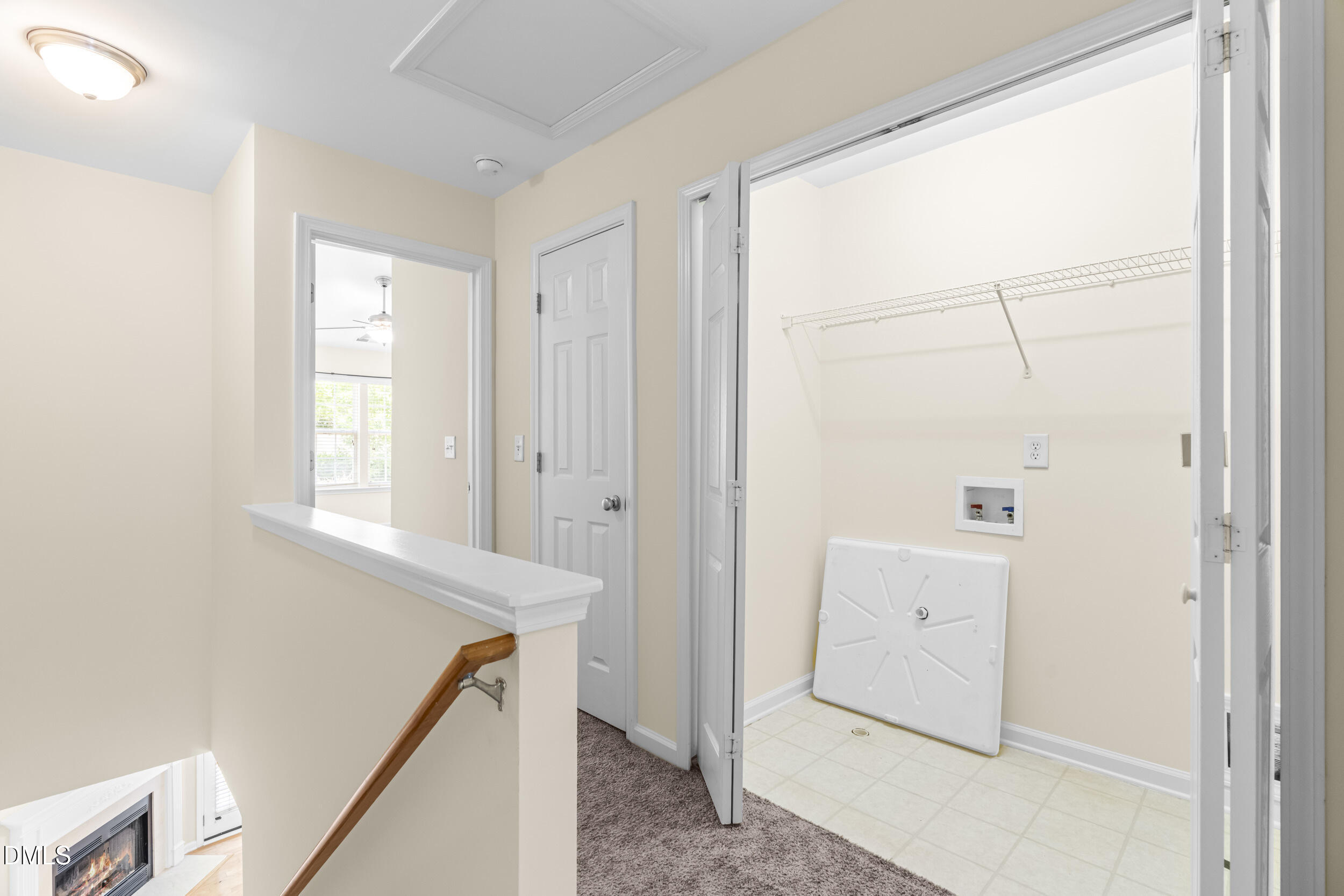 8246 City Loft Court Raleigh, NC 27613 - Photo 26 of 33 Primary hallway between bdrms