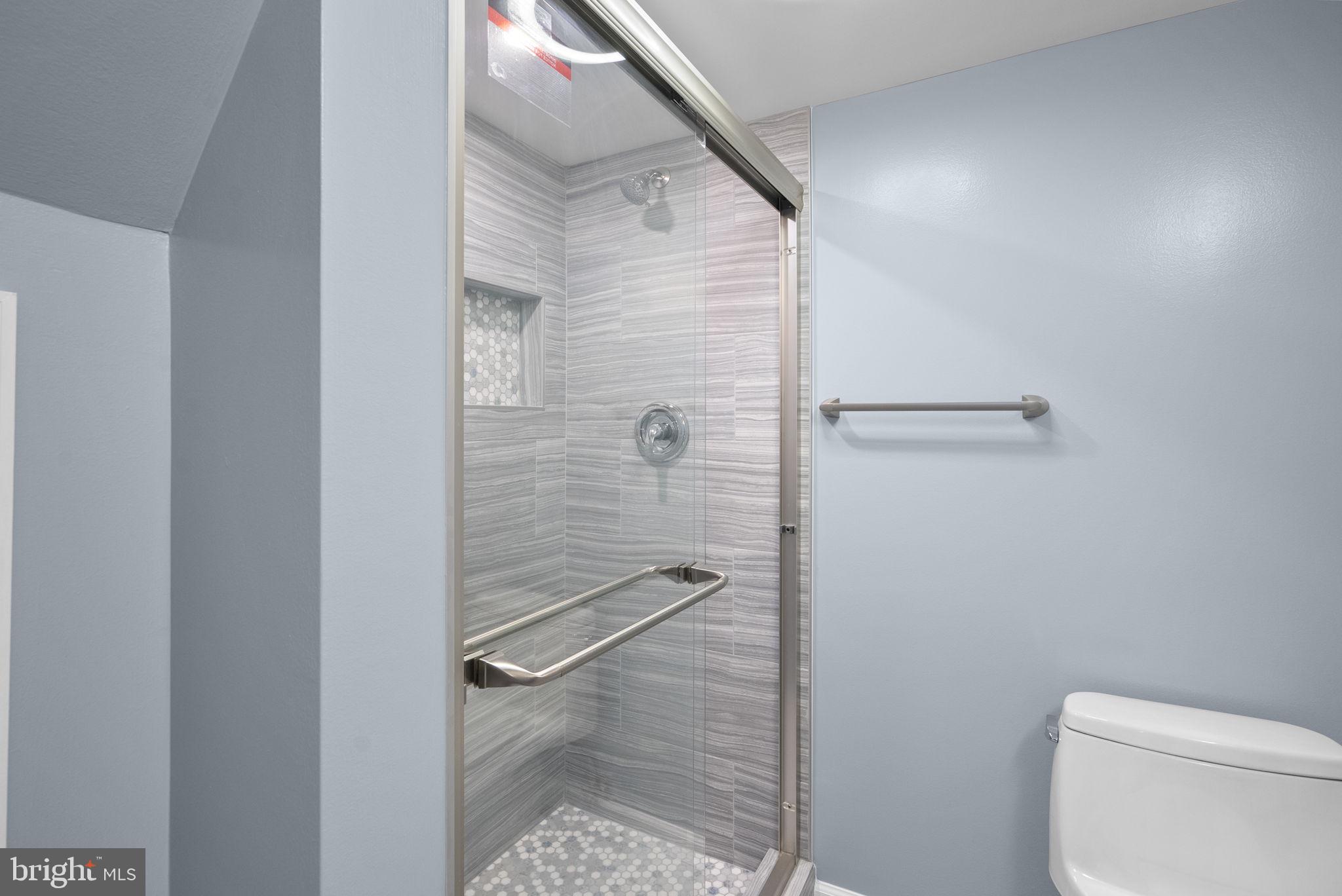 3013 Medway Street Silver Spring, MD 20902 - Photo 25 of 30 Modern shower with sleek design.