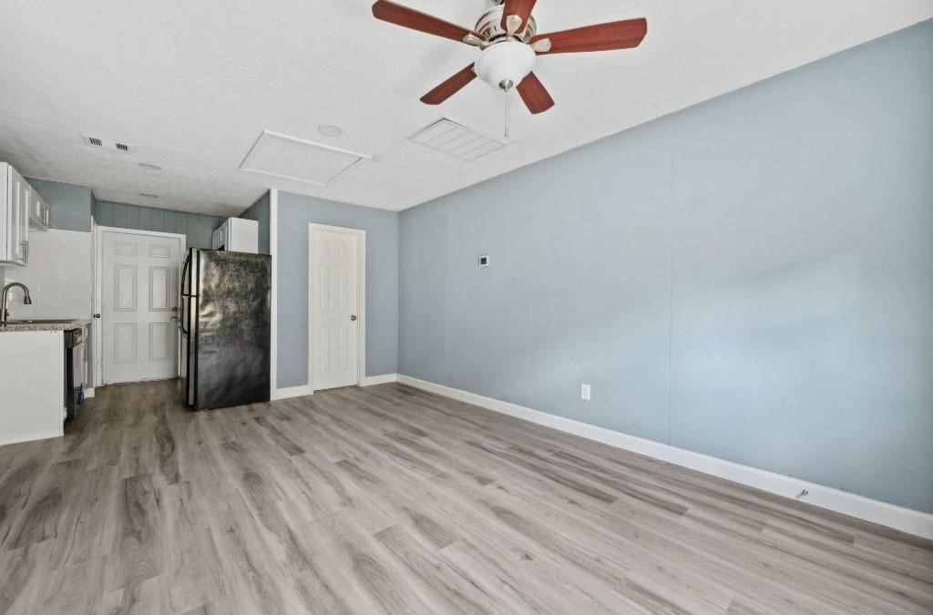 3423 Nettleton Street Houston, TX 77004 - Photo 13 of 14 a view of an empty room with a ceiling fan