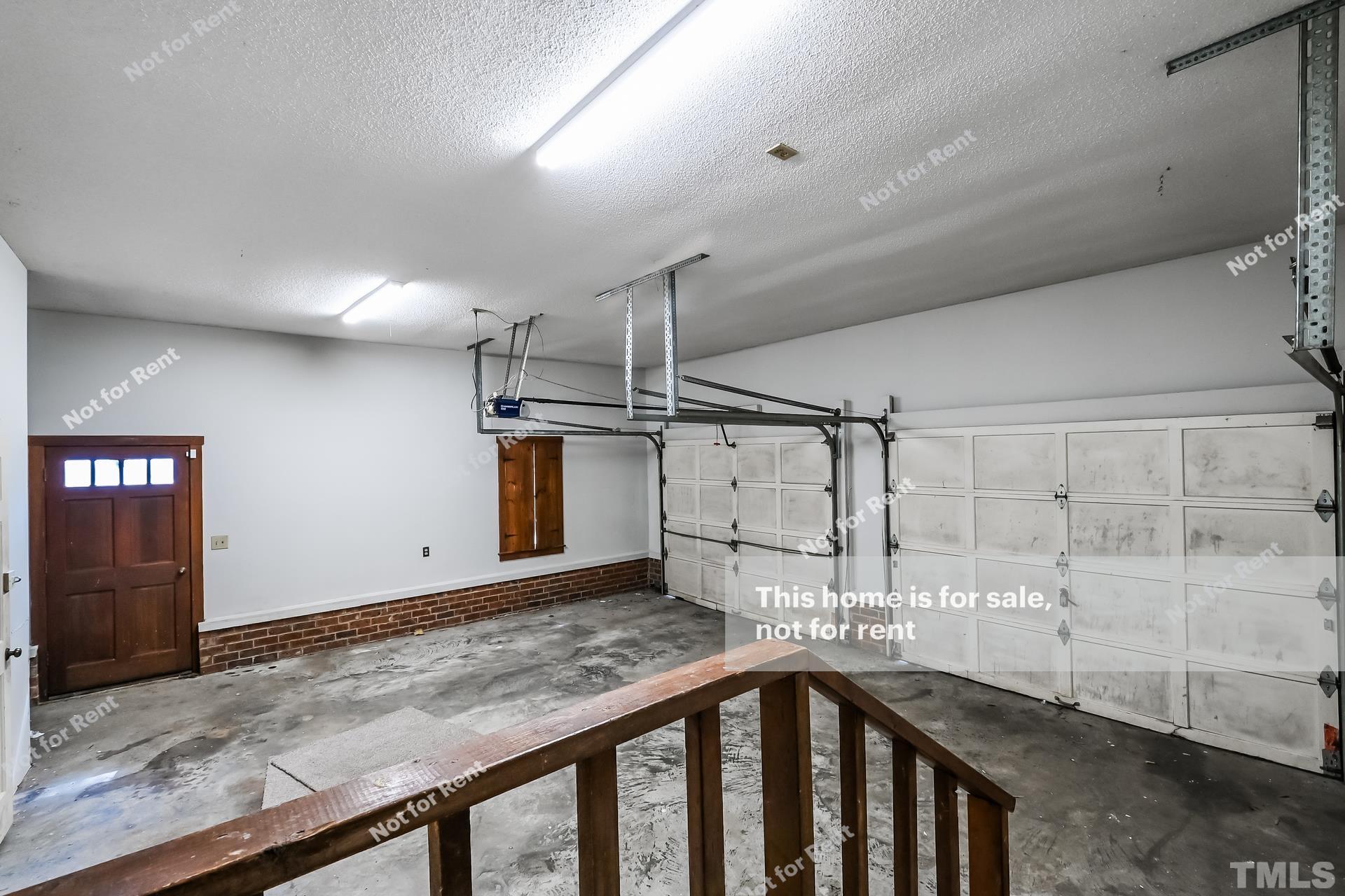 6587 Dwight Rowland Road Willow Spring, NC 27592 - Photo 21 of 25 a view of a storage & utility room
