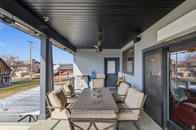 175 North 100 West Providence, UT 84332 - Photo 31 of 45 View of patio with outdoor dining area, ceiling fan, heaters, blower and a residential view