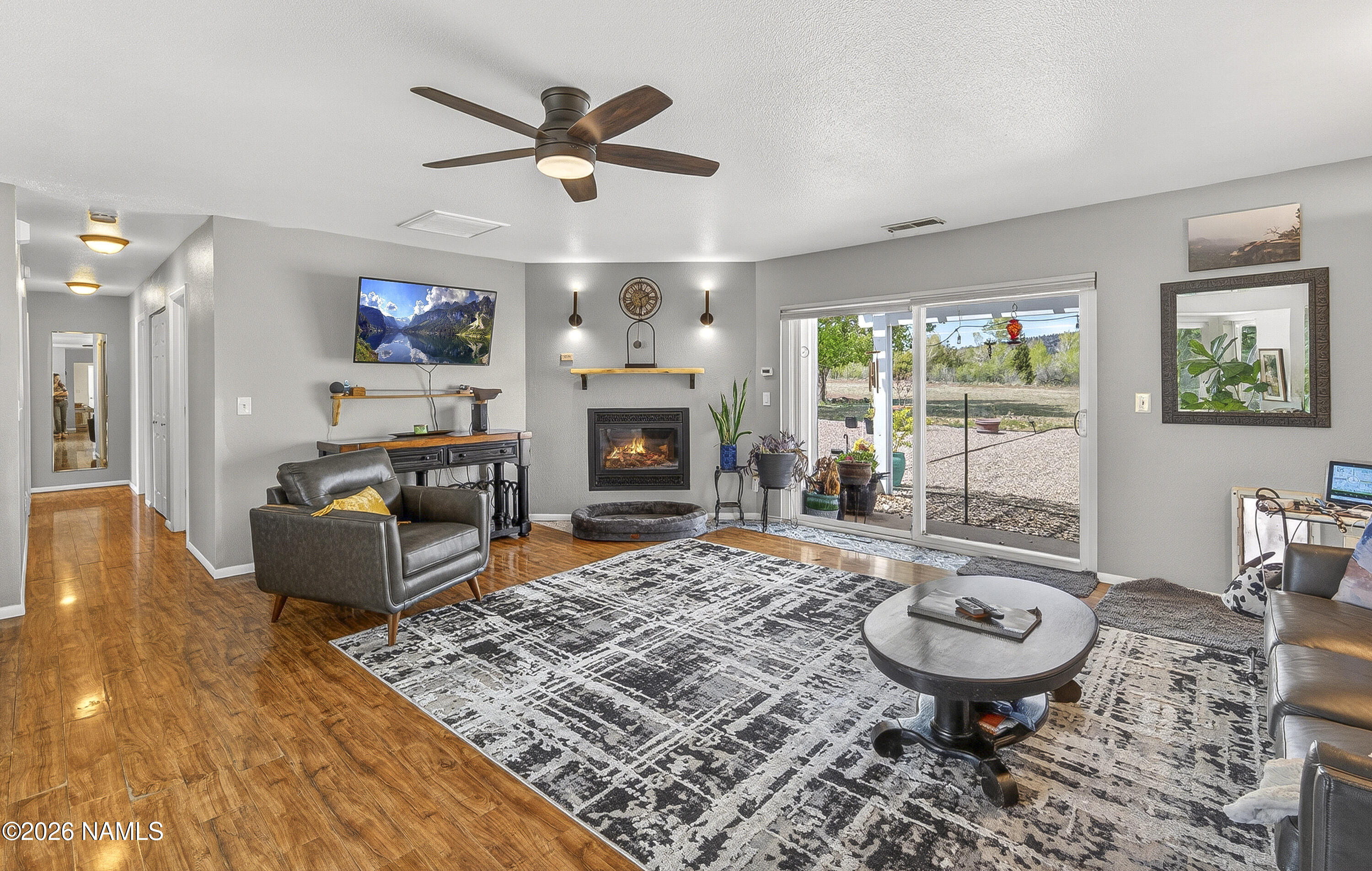 5640 East Atkinson Road Flagstaff, AZ 86004 - Photo 17 of 53 Cozy up around This Fireplace