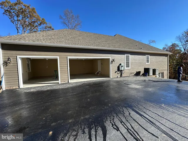 a view of a street with some trees in front of it