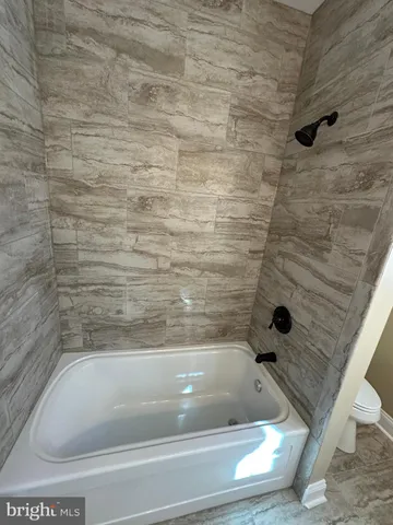 a bathroom with a bathtub
