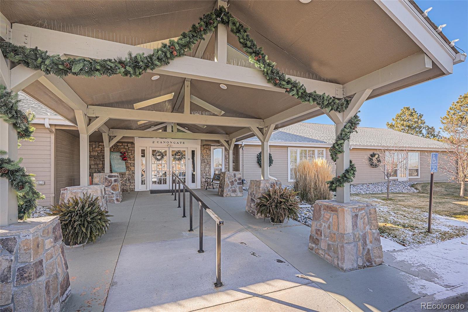 16 Shetland Court Highlands Ranch, CO 80130 - Photo 23 of 25 a view of a patio with table and chairs potted plants