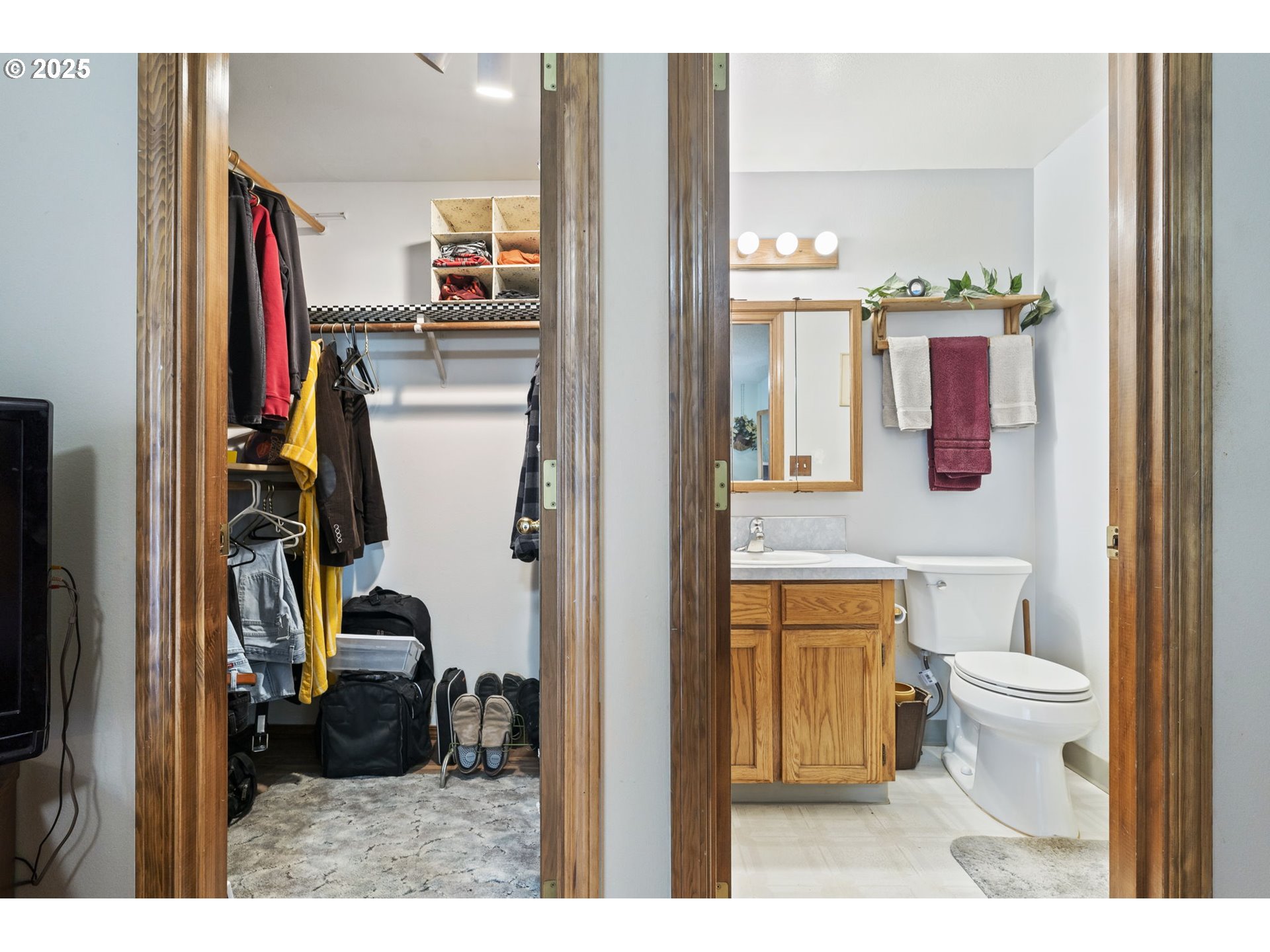 2320 Northeast Juniper Avenue Gresham, OR 97030 - Photo 19 of 34 a bathroom with a toilet sink and mirror