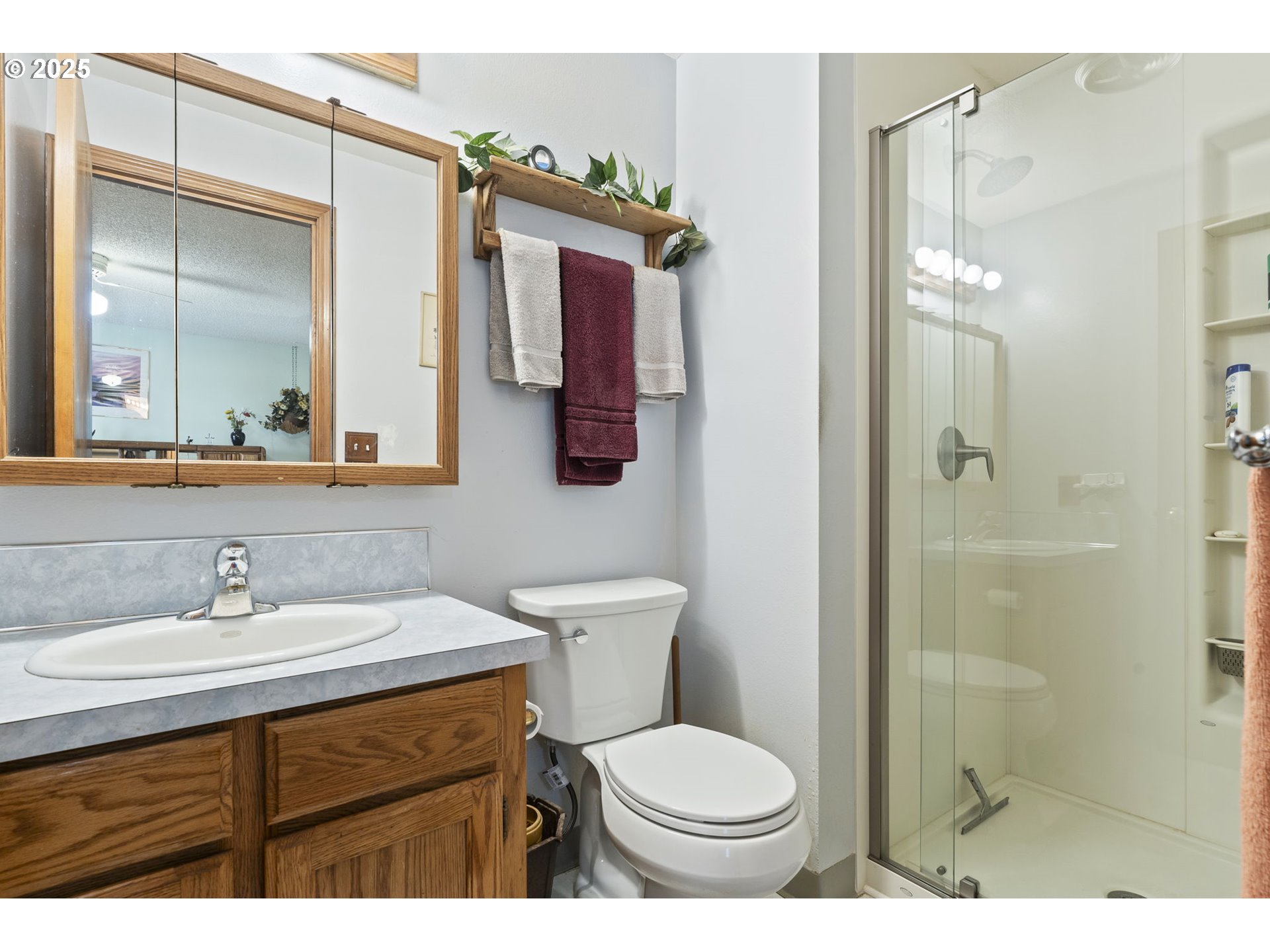 2320 Northeast Juniper Avenue Gresham, OR 97030 - Photo 20 of 34 a bathroom with a sink toilet and shower