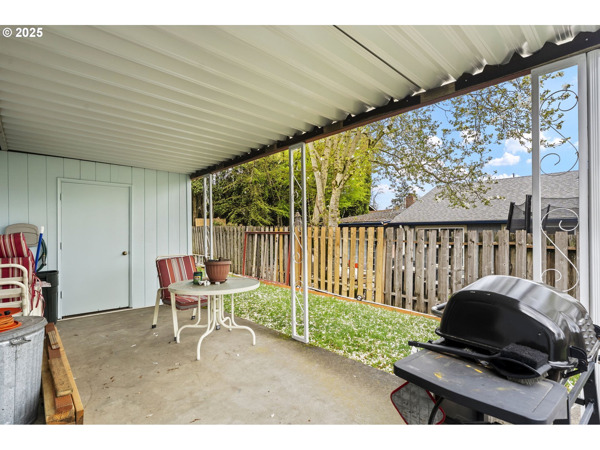 2320 Northeast Juniper Avenue Gresham, OR 97030 - Photo 32 of 34 a living room with a couch and a large window