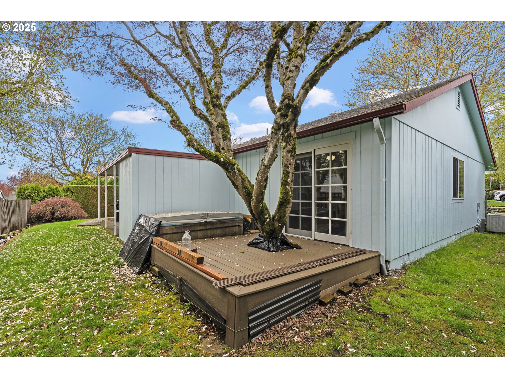 2320 Northeast Juniper Avenue Gresham, OR 97030 - Photo 33 of 34 a view of backyard with a large tree and a large tree