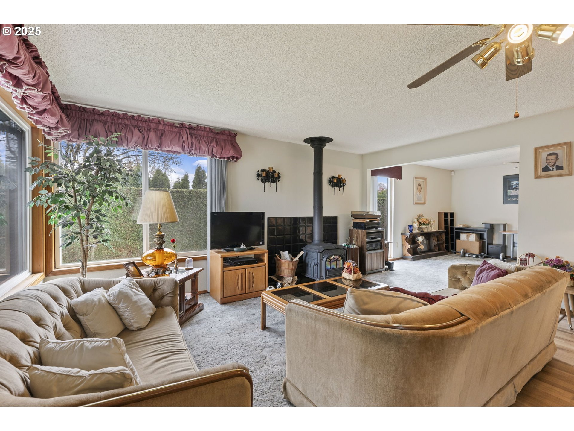 2320 Northeast Juniper Avenue Gresham, OR 97030 - Photo 9 of 34 a living room with furniture and a large window
