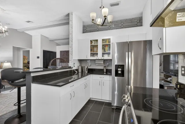 $915,000 | 15773 85th Road North, The Acreage, FL 33470