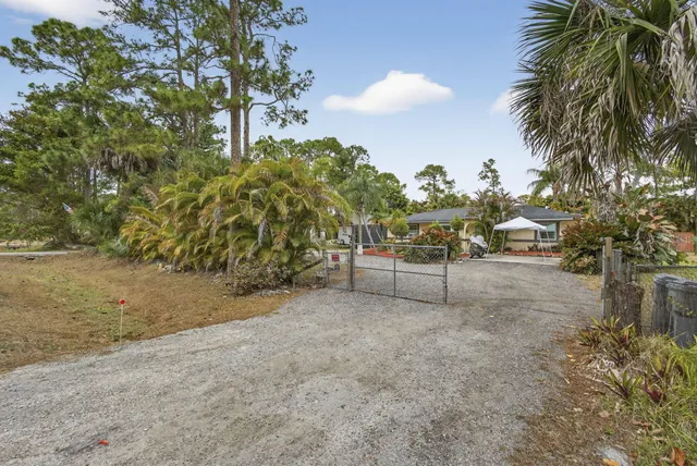 $915,000 | 15773 85th Road North, The Acreage, FL 33470