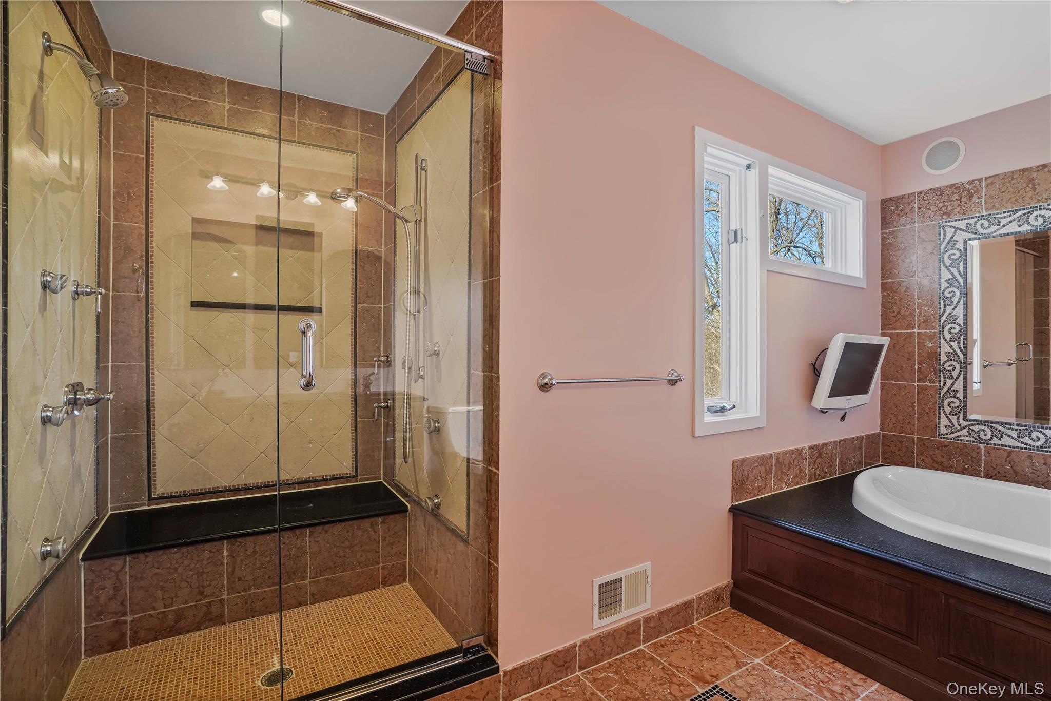 208 Boulder Ridge Road Scarsdale, NY 10583 - Photo 19 of 43 Bathroom with a stall shower, tile patterned floors, and a garden tub