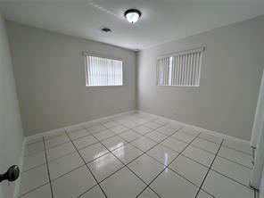 3614 Taylor Street Hollywood, FL 33021 - Photo 12 of 20 a view of an empty room and window