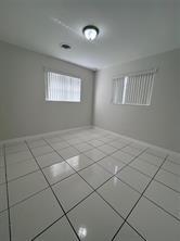 3614 Taylor Street Hollywood, FL 33021 - Photo 13 of 20 a view of an empty room and window