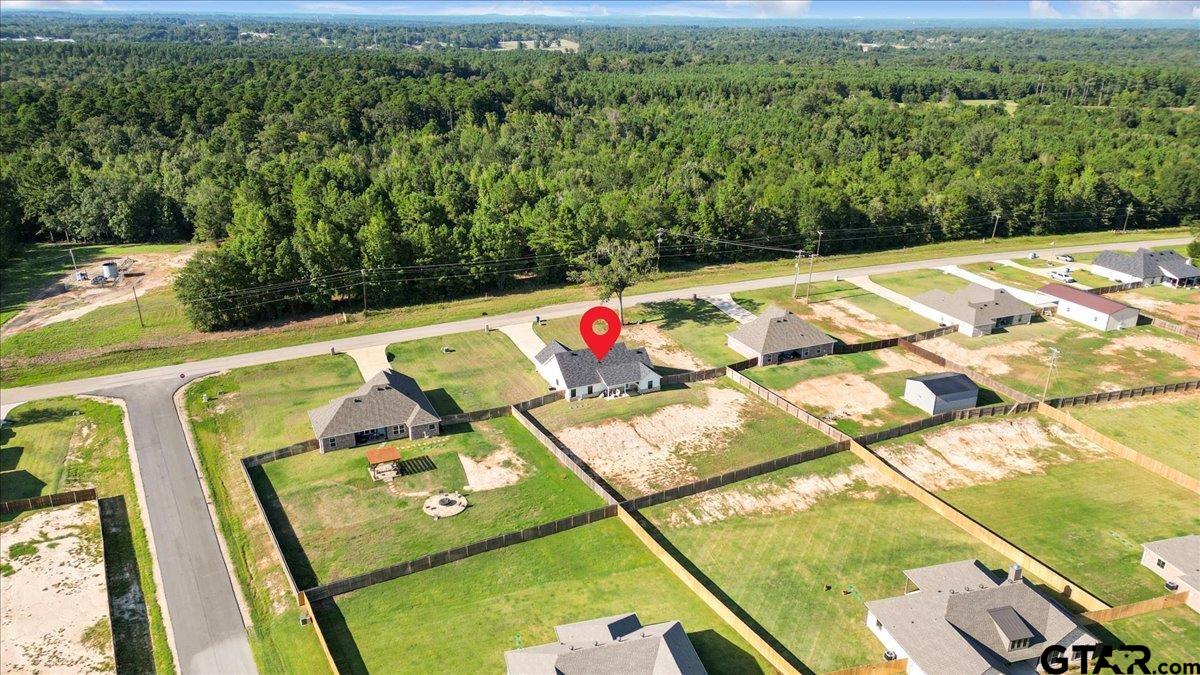 681 Peavine Road Kilgore, TX 75662 - Photo 27 of 27 a view of a balcony with chairs
