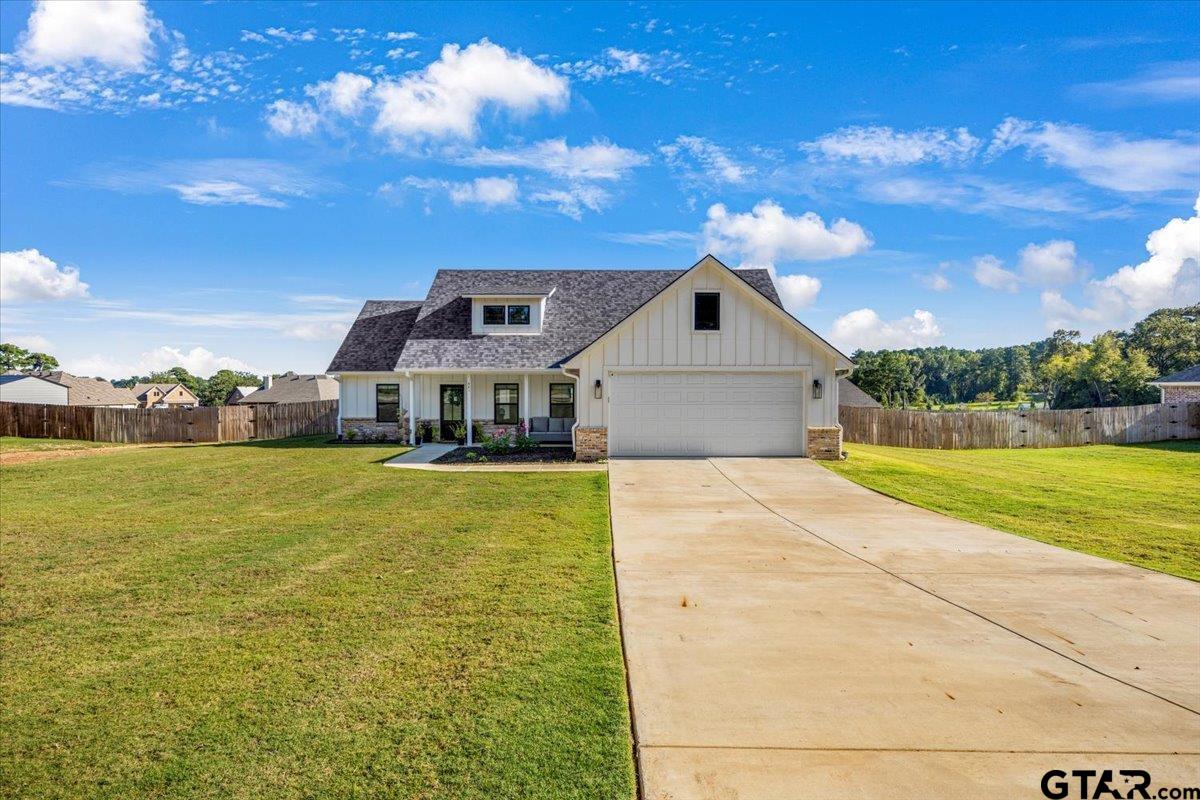 681 Peavine Road Kilgore, TX 75662 - Photo 6 of 27 a front view of house with yard and ocean view